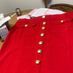 Elegant Red Button-Down Skirt. Pull on waist. Longer length   Length is 32